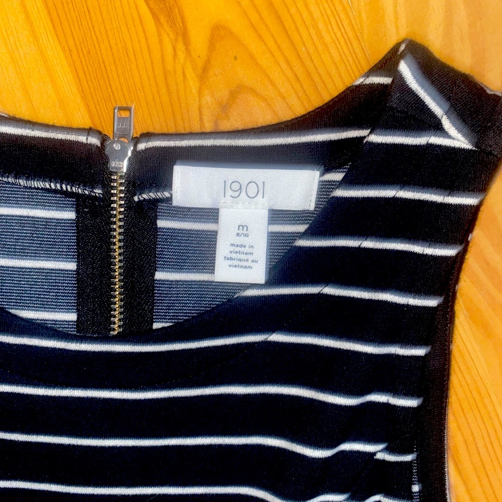 Black and white stripe skater style dress. Super comfortable, yet dressy.